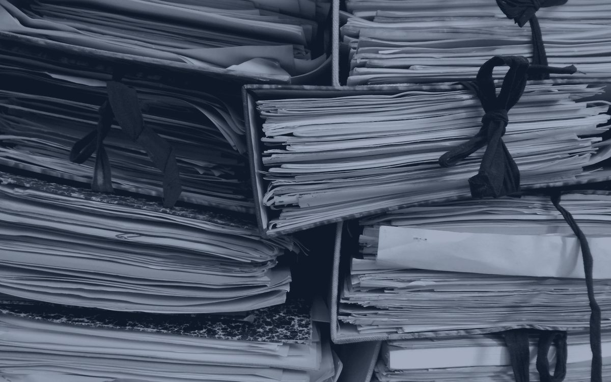 Stacks of paperwork waiting